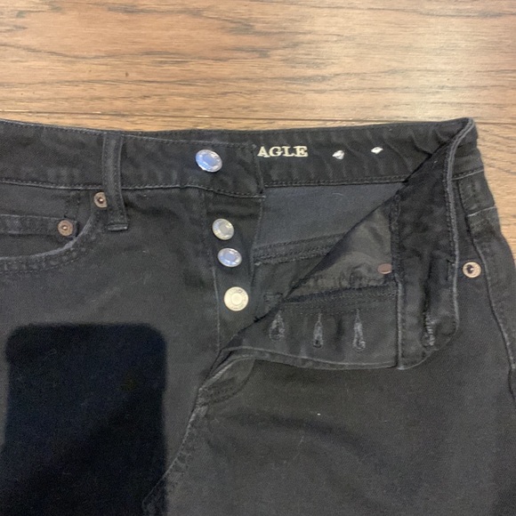 Black denim mini skirt. Button fly - Picture 4 of 5